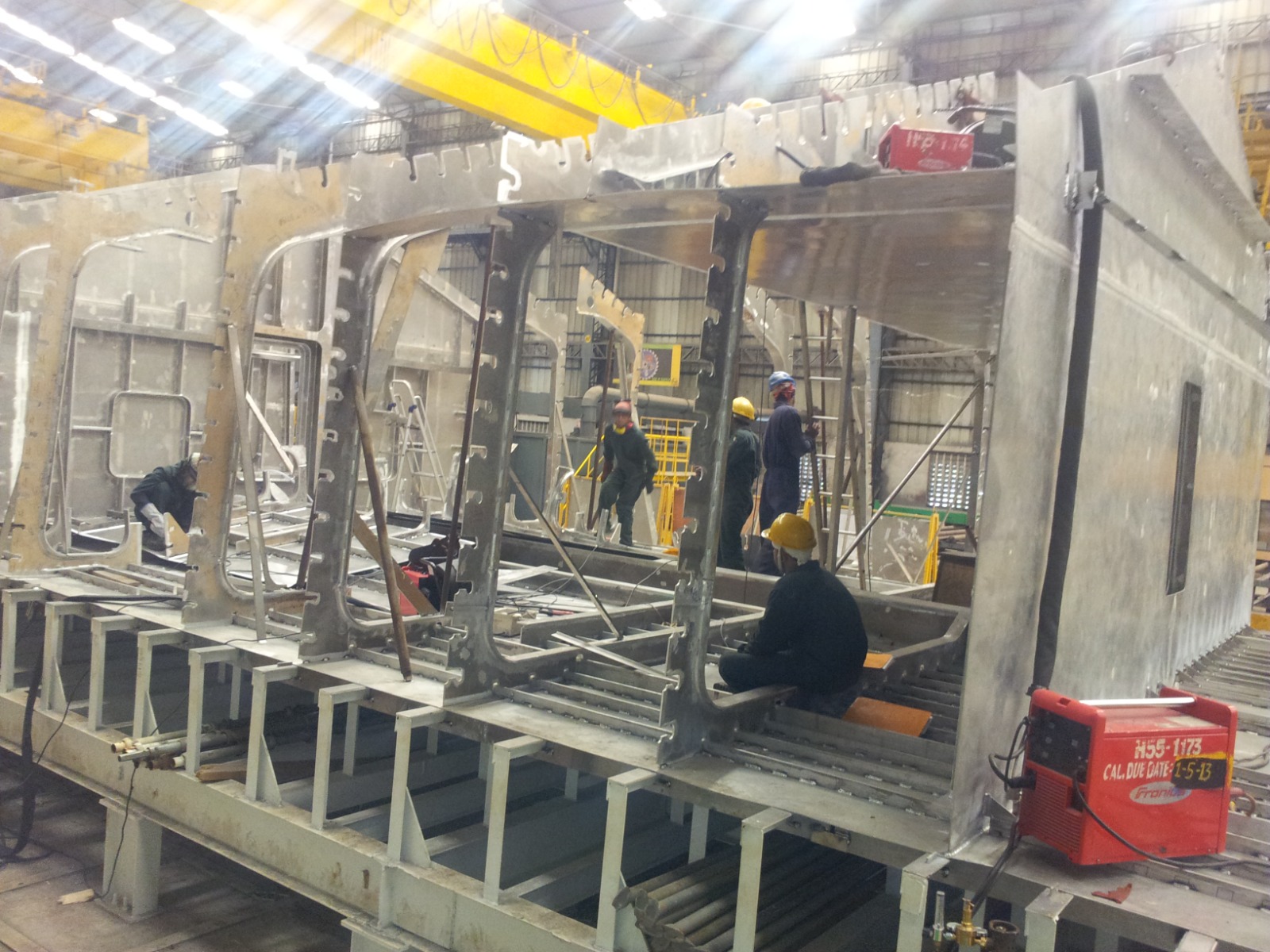 Naval module fabrication work inside a production bay