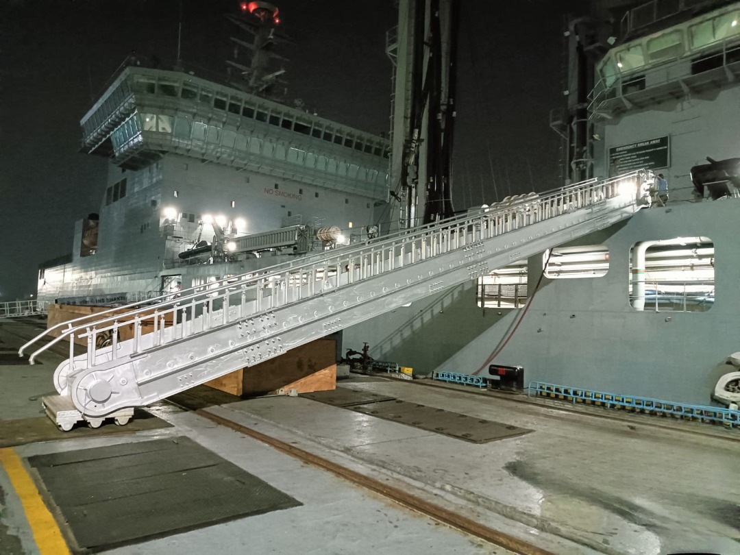 Tide Efficient Gangway deployed between shore and naval vessel for safe personnel and material transfer